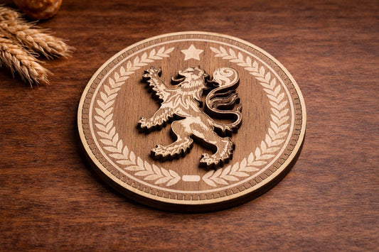 Wooden coaster with engraved lion design on a wooden surface