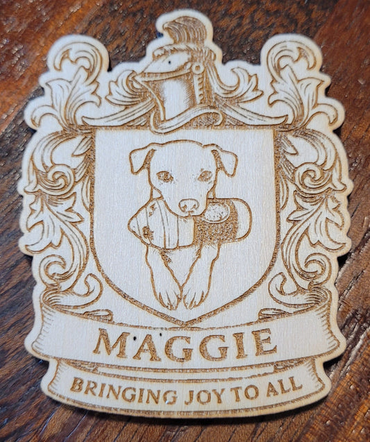 Decorative coaster with 'Maggie' branding on a wooden surface